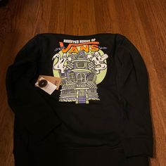 New With Tags. Comes From A Smoke And Pet Free Home. Vans Long Sleeve Graphic Print Top, Black Glow In The Dark Crew Neck Top, Casual Black Glow In The Dark Top, Vans Tops For Winter Streetwear, Winter Vans Tops For Streetwear, Black Cotton Top With Glow In The Dark Details, Halloween Glow In The Dark Black Top, Vans Shirts, Vans Shirt