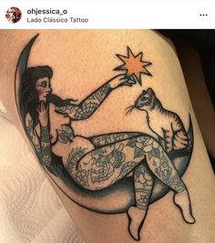 a woman holding a cat on the moon with stars in her hands tattoo by jose clasico