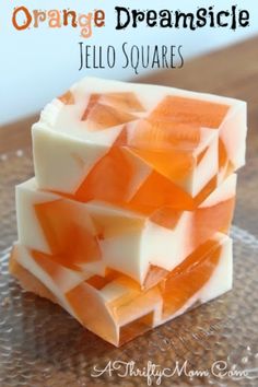 orange and white jello squares stacked on top of each other with text overlay