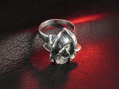 "Oxidized sterling silver rose ring. Hallmark: 925 Approximate weight: 8.1 g Width: 0.82 inches Shipping: - we prepare our orders ready for shipping in 3-7 business days, all items are made to order, they are not kept in stock; - we will provide tracking number as soon as order will be shipped. EXPRESS shipping: if you are interested in FAST delivery, we offer very fast and high quality \"door to door\" service by UPS Express. Delivery: within Europe - 1 business day, within USA, Canada and Aust Rose Sterling Silver Promise Ring, Formal Rose Gold Sterling Silver Flower Ring, Silver Flower Ring With Roses For Gift, Sterling Silver Rose Flower Ring For Anniversary, Elegant Sterling Silver Rings With Roses, Rose Sterling Silver Rings As Gift, Rose Sterling Silver Ring Gift, Rose Sterling Silver Rings For Gifts, Sterling Silver Rose Flower Ring With Rose Design