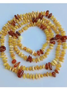 This long necklace is made Genuine Baltic Amber milk yellow and cognac color Boho Wrap Multicolor Stone Bead Necklace Long Tie Choker Lariat Necklace Gift Woman jewelry120 centimeters 47.30 inch US sizeyellow beads from 7 mm to 10 mm in length cognac - from 10 mm to 13 mm - in length 32 gramsThis jewelry will go to you as in the picture------------------------------------------FREE SHIPPINGFast shipping 1-3 business days with tracking number what could you trackEstimated delivery time 3-4 weeks   For holidays, Christmas gifts , order gifts in advance, preferably 2-3 months in advance.----------------------------Visit the AmberStar store to choose a gift for yourself and your friends brooches, pendants, necklace, braceletlink    shop AmberStar https://ballwool.com/shops/AmberStar----------- Tie Choker, Stone Bead Necklace, Woman Jewelry, Pendants Necklace, Wrap Necklaces