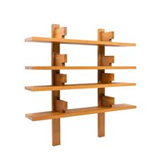 a wooden shelf with several shelves on it