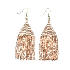 PRICES MAY VARY. Boho Statement Earrings: Part of our luxe collection accessories, the luxe petite fringe earrings are hand crafted by artisans in India. Delicate glass beads with an elegant shimmer are woven for a luminous, lightweight and effortlessly cool beaded statement accessory. Dazzling Rose Gold Earrings: The Lexie Luxe Earrings boast a dazzling Rose Gold hue, adding a touch of glamour and playfulness to your boho-chic ensemble. Handmade by skilled artisans in India. 5% of proceeds from Bohemian Teardrop Dangling Beads, Dangling Bead Tassel Earrings For Festivals, Bohemian Dangle Tassel Earrings For Festive Occasions, Festival Tassel Earrings With Dangling Beads, Festival Earrings With Gold Beads, Bohemian Style Festive Dangle Tassel Earrings, Festival Tassel Earrings With Beaded Fringe, Festival Beaded Fringe Tassel Earrings, Gold Beaded Drop Earrings For Festivals