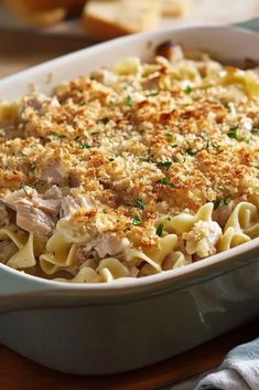 a casserole dish filled with chicken and pasta