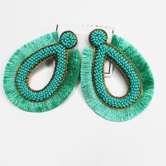 This Teardrop Turquoise Sleek Earrings Is The Ultimate Currently Trendy Ladies Earrings That You'll Need To Complete This 2019 Summer Fashion Style. This Earrings Measures About 2.5". Green Teardrop Jewelry For Summer, Turquoise Dangle Tassel Earrings For Party, Turquoise Tassel Earrings For Beach, Green Drop Tassel Earrings For Beach, Green Tassel Drop Earrings For Beach, Summer Beach Turquoise Tassel Earrings, Trendy Green Tassel Earrings, Trendy Turquoise Beaded Drop Earrings, Trendy Green Tassel Drop Earrings