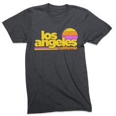 Free Shipping!! Part of our Radical States series, the Los Angeles Sunset shirt is a tribute to old school LA. A retro style and vintage inspired graphic tee printed on a very comfortable, nicely fit shirt. Heather Dark Grey vintage style tee. Men's / Women's / Unisex We use shirts and tanks from companies dedicated to ethical standards of conduct. They are child labor free and sweat shop free. The printing uses inks that are water based and eco-friendly. View our full store: https://www.etsy.co Surf California, Los Angeles Sunset, Retro Shirt Design, Sunset Shirt, La Style, California Shirt, California Surf, Vintage Los Angeles, Retro Tee