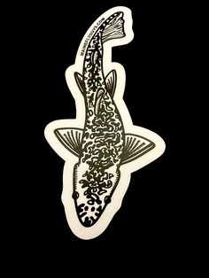 a sticker with an image of a fish on it's back side, in black and white