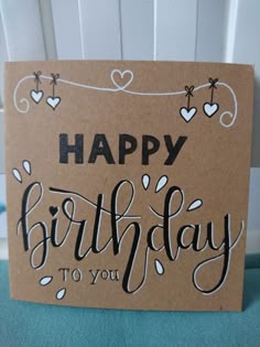 a brown card with the words happy birthday to you