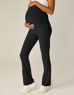 The full-length pant you'll be wearing every day of pregnancy, Mama. Incredibly flattering with flare ankle and high waistband for over or under bump. Sport for some light stretching, style them up for work, or pair with your favorite sweater in the evening. The possibilities, just like the softness, are endless. Designed and assembled in the USA High waist for over or under bump Wide leg opening 31.5” inseam Made to fit through pregnancy and beyond Maternity Pants With Elastic Waistband, Stretch Casual Maternity Pants, Casual Stretch Maternity Pants, Athleisure Maternity Bottoms Bump Friendly, Stretch Full Length Maternity Bottoms, Maternity Stretch Bottoms With Elastic Waistband, Maternity Bottoms With Elastic Waistband And Stretch, Stretch Maternity Pants Casual Style, Casual Maternity Stretch Pants