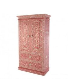 a red and white cabinet with ornate designs on it