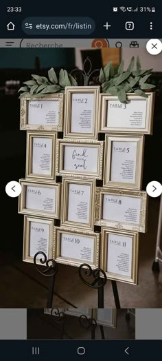 a bunch of frames that are on top of a table