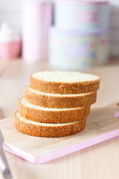 four slices of cake sitting on top of a cutting board with the words moly cake above it