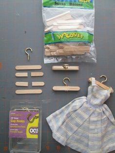 some clothes hangers and other items on a table