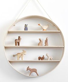 an image of a shelf with animals on it