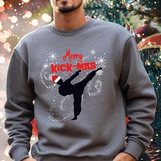 IMPORTANT HOLIDAY ORDERING INFO: In order to avoid holiday delivery issues, please place your order no later than December 9th. Orders placed after that date may not arrive in time!  Ideal for any situation, a unisex heavy blend crewneck sweatshirt is pure comfort. These garments are made from polyester and cotton. The collar is ribbed knit, so it retains its shape even after washing. There are no itchy side seams on these sweaters.  .: Made with a medium-heavy fabric blend of 50% cotton and 50% Karate Christmas, Tae Kwon Do, Martial Artist, Christmas Shirt, Xmas Gifts, Cut And Style, Heavy Fabric, Karate, Christmas Shirts