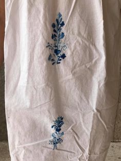 "Elegant dress and colourful hand-embroidery. Perfect for mexican wedddings, mexican parties, etc. In perfect conditions. Made in the 80's Colour: White, embroidery in different tones of blue Loose fit Fits size Small Measurements taken flat: Armpit to armpit 21\" Width 24 1/2\" Shoulder to bottom hem 42 1/2\" It only has a small black stain, barely noticeable, shown in the last photo" White Cotton Maxi Dress With Chikankari Embroidery, White Folk Style Cotton Maxi Dress, White Cotton Folk Maxi Dress, Bohemian Embroidered Cotton Dress For Wedding, Bohemian Embroidered Cotton Wedding Dress, Bohemian Cotton Embroidered Dress For Wedding, Bohemian Cotton Embroidered Wedding Dress, Summer Wedding Embroidered Cotton Dress, Short Sleeve Cotton Dresses With Embroidered Border