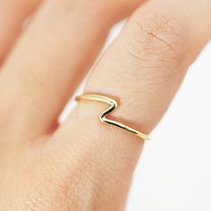 +FREE SHIPPING WTHIN AUSTRALIA OVER $50+ PROMOTION CODE OVER50FREESHIPPING +FREE WORLDWIDE SHIPPING OVER AUD$120+ PROMOTION CODE OVER120FREESHIPPING -Product details- Hand-made solid 14K / 18K gold ring. This ring suits both female and male. This simple and natural design is perfect to layer and pair with other rings.  A great everyday companion. The ring is highly polished as shown in the photo.  *This is a hand made to order item. It will take 5-9 working days to make and polish it. Her Banana Gold Wavy Jewelry For Everyday, Minimalist 14k Gold Wavy Ring, Everyday Yellow Gold Wavy Jewelry, Everyday Wavy Yellow Gold Jewelry, Minimalist 14k Gold Wavy Jewelry, Wavy Stackable Rings, Minimalist Yellow Gold Wavy Ring, Minimalist Wavy Yellow Gold Ring, Gold Wavy Rings For Gifts