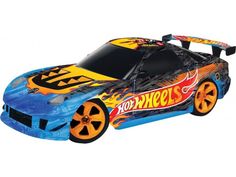 a blue and yellow toy car with flames on it's body, sitting in front of a white background