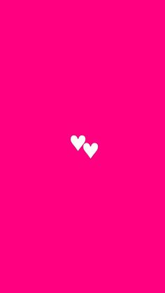 two hearts on a pink background with one white heart in the middle and another red