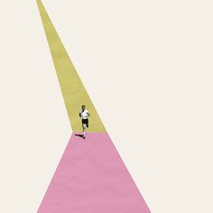 a man is running down a pink carpeted path with two yellow lines on it