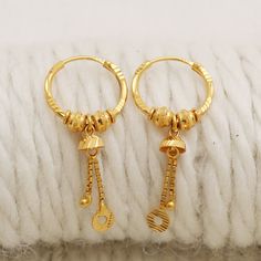 Please click -- Learn more about this item -- below for a full description 22k gold earrings handmade jewelry made in India weight is 2.37 grams approx. length is 3.4 centimeter approx. width is 1.4 centimeter approx. please message me if you want real gold screw/backs. Bali Gold Earrings, 22k Gold Dangle Hoop Earrings, 22k Yellow Gold Dangle Earrings, 22k Yellow Gold Dangle Danglers, 22k Gold Hallmarked Hoop Earrings, 22k Gold Small Hoop Earrings, Small Hoop Earrings In 22k Yellow Gold, Gold Bali Earrings Indian, Ring Earrings Gold