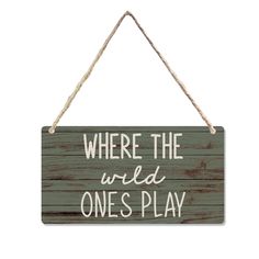 a sign that says where the wild ones play on it, hanging from a rope