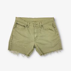 "Gender:Womens  Vintage Levi's 511 cut off denim shorts in khaki green with a zip fly. Waist measures size W32. Made from cotton blend.  Condition:Excellent  Some distressing to the side seam. Please see pictures.  Measurements:     Waist: 32\"   Leg Length: 4\"" Green Bottoms With Frayed Hem In Short Length, Green Shorts With Frayed Hem, Green Cutoff Cotton Jean Shorts, Green Cotton Cutoff Jean Shorts, Green Cutoff Shorts With Pockets, Denim Scraps, Jean Vintage, Cut Off Jeans, Short Jeans