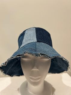 Handmade up cycled denim bucket hat. Unfinished brim edge. Lined with cotton print fabric. Crown features an functional front jean pocket. 23 inches around. various shades of denim. Great casual sun hat.  Easy care, wash with jeans. Cheap Denim Blue Hat With Short Brim, Fabric Crown, Denim Bucket Hat, Port Angeles, Jean Pockets, Bucket Hats, Sun Hat, Print Fabric, Sun Hats