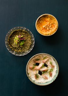 three bowls with different types of food in them