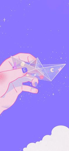 a hand holding an origami airplane in the sky with stars and clouds around it