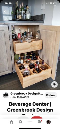 an open cabinet filled with lots of bottles and liquors in it's drawers