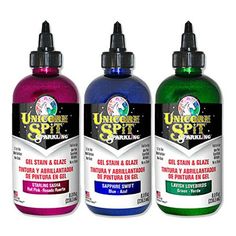 three bottles of different colors of paint on a white background with the words, ultimate spirit