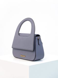 Editor's NoteNILLRING's accessories represent a natural, simple and modern mood. - Satchel bag- Handle on the top- Soft and warm texture- Modern mood- Inside pocketMeasurement (inches)One size- Width: 9.33 in./ Height: 6.89 in./ Depth: 3.35 in.Composition & Care- Artificial leather- Professional care onlyDesigner- by NILLRING Modern Flap Bag With Round Handle For Everyday Use, Modern Everyday Flap Bag With Handles, Modern Flap Bag With Handles For Everyday, In Depth, Satchel Bag, Bag Handle, Artificial Leather, Satchel Bags, Satchel