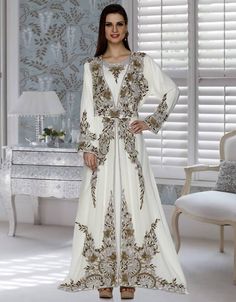 Mashallah! ❤️ Embellish Embroidered Stylish Kaftan Dresses Shop Now : https://bit.ly/3y8gxd8 Buy online @ $249.95 #formalkaftandresses #indiankaftandressesforsale #kaftancollection #prettykaftans #simplekaftandresses #stylishkaftandresses #kaftansformensonline #middleeasterninspireddresses #gorgeouskaftans #cottonkaftansonline #bedouinrobesforsale #arabicwomensclothes #womenarabicclothing #islamicfashionnearme #dressesarabicstyle #fullislamicdress #moeslemattire #colorfulkaftandresses Luxury Designer Kaftan With Intricate Embroidery, Luxury Resham Embroidered Evening Kaftan, Elegant Luxury Kaftan With Dabka Work, Luxury Kaftan With Pearl Embroidery For Eid, Luxury Embroidered Kaftan For Ceremonial Occasions, Luxury Embroidered Beige Kaftan, Luxury Spring Kaftan With Embroidered Border, Luxury Women's Kaftan With Embroidered Sleeves, Luxury Embellished Long Sleeve Thobe