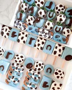 a box filled with cookies and desserts on top of a table