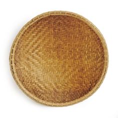 a woven basket is shown on a white background