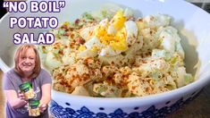 a woman holding a can of potato salad in front of a bowl full of potatoes