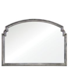 an arched mirror on a white wall