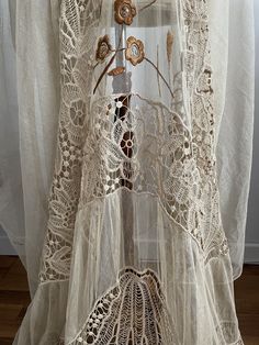 RARE and Beautiful ! Antique 1910s -1920s beige lace curtain with beautiful details, all handworked and hand embroidered with cotton and silk. The color is beige. ✂-----Measurements : length: 100 inches width: 65 inches condition : excellent ( no holes ) Please message me if any additional measurements are needed or if you have any questions about this item. I can usually respond within 24 hours. Shipping Is Avaliable Worldwide. Every item is carefully shipped Priority via Air Mail - shipping ta Bohemian Beige Crochet Lace, Beige Bohemian Crochet Lace, Bohemian Cream Crochet Lace, Cream Bohemian Lace With Lace Trim, Bohemian Cream Lace With Lace Trim, Bohemian Cream Lace For Summer, Cream Bohemian Summer Lace, Vintage Cream Lace For Summer, Bohemian Cotton Lace Patchwork