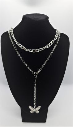 Our multi-layered necklaces are playful yet elegant and give you a classy look. Set in sparkly silver. This piece will definately standout. Features Item Type- Multi-layered Necklace Style Vintage Chain Type- Link Chain Material- Zinc Alloy Metal Color- Silver shipping weight 100g Please look below for shipping times: Canada Orders ship & arrive within 3 to 9 business days (CAN) International Orders may take up to 2-4 weeks for arrival. Rural cities may take longer to arrive. Some countries Trendy Multi-strand Layered Chain Necklace, Alloy Layered Choker Necklace With Clavicle Chain, Elegant Silver Double Strand Charm Necklaces, Trendy Multi-strand Charm Necklaces, Silver Alloy Layered Necklace, Layered Choker Necklace For Party, Silver Long Charm Necklace In Alloy, Silver Alloy Long Charm Necklace, Trendy Multi-strand Metal Charm Necklaces