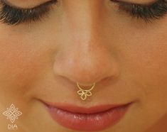 14K SOLID GOLD delicate flower septum hoop earring. Perfect as body piercing too. ---> Features: ♦ Material: 14k SOLID GOLD yellow ♦ Tiny flower size: length: 7.9 mm width: 5mm Select your preference in the gauge / diameter at the top right of this page. ♦ Gauge: wire hoop thickness: Select your preference in the gauge at the top right of this page. *Gauge: the thickness of the wire the smaller the gauge the thicker the earring shaft is. 16 gauge - 12 mm ( 18 gauge - 10 mm 20 gauge - 8 mm 22 Dainty Internally Threaded Nose Rings For Wedding, Dainty Hypoallergenic Nose Rings For Wedding, Nickel-free Hoop Septum Ring For Wedding, Nickel Free Hoop Septum Ring For Wedding, Gold Hypoallergenic Nose Rings For Wedding, Tiny Gold Nose Rings For Wedding, Minimalist Gold Septum Ring For Wedding, Minimalist Gold Wedding Septum Ring, Gold Septum Ring For Wedding