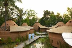 a group of clay huts sitting next to each other