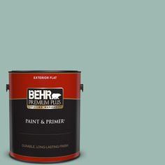 a can of behr premium plus paint and primer in one on a blue background