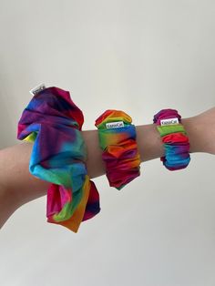 "Elevate your hairstyle with our Ombre Rainbow Scrunchie, a vibrant celebration of diversity and style that adds a pop of colour to your look. Due to the nature of the ombre fabric each scrunchie has a different swirl of vivid colour so each pouch is unique.  Meticulously crafted, this scrunchie features joyful ombre rainbow, embodying the spirit of unity and inclusivity. The high-quality fabric ensures a soft and comfortable hold for your hair, making it perfect for all-day wear without causing any discomfort. Our Ombre Rainbow Scrunchie is more than just a hair accessory - it's a statement of embracing differences and showcasing your support for a diverse world. Whether you're heading to a Pride event, expressing your personality, or simply adding a burst of colour to your outfit, this s Pride Event, Ombre Fabric, Fabric Lanyard, Pom Pom Earrings, Work Accessories, Wrist Lanyard, Colorful Hair, Your Hairstyle, Cool Patterns