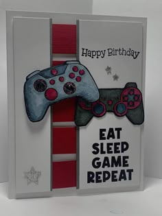 a birthday card with a video game controller on the front and words happy birthday, eat sleep game repeat