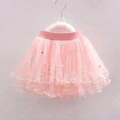 DAETIROS Sequin Skirt Girl, Cute Party Birthday Gift Solid Color Pleated Tulle Cozy Girls Clearance Skirt Pink Size 5 T Each skirt is made of high-quality fabric to ensure breathability and comfort, so that children can enjoy the fun of summer whether playing at home or going out. We also offer a wide range of sizes, check the feedback from other parents in the comments, make it easy to choose a dress that fits your child, and offer occasional promotions, let you buy summer dresses for children at a more favorable price. Come shopping, let's witness the wonderful summer time for our children. Related keywords: DAETIROS Girls Skirt,Skirt Kilt Kids,Kids Skirt Pocket,Girl Skort Size 6/6x,Kid Girl Skirt,Toddler Girl Skort Set 3t,Skirt for Big Kids Gender: female. Winter Skirt Fashion, Gauze Skirts, Girls Ballet, Ballet Tutu, Winter Skirt, Swimwear Bottoms, Dance Costume, Baby Winter, Tutu Skirt