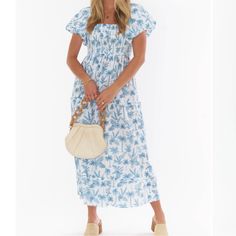 Summer Afternoons Call For The Norma Midi Dress. Adorable Puffed Sleeves Meet A Flattering Smocked Bodice And Back Before Ending With A Three-Tiered Hem Decorated In A Nautical Blue Palm Print. We Love This Charming Midi Paired With White Strappy Heels And Gold Jewelry. Brand New With Tags Size 1x *Lightweight Textured Stretch *55% Linen, 45% Cotton *Smocking *Pockets 4th Of July Bikinis, White Strappy Heels, Beachy Outfits, Skirts Casual, Midi Dress Blue, Fashion And Beauty Tips, Summer Work Outfits, Bridesmaid Style, Palm Print