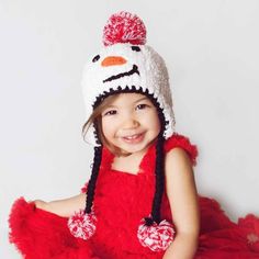 Ultra soft snowman beanie is perfect for chilly weather. Earflap style hat is trimmed with a snowman face and is accented with red and white pom poms. This looks adorable with our Polar Play Legwarmers! • 100% Acrylic • Cold handwash • Hand knit in China Snowman Mittens, Girls Beanie Hats, Snowman Baby, Toddler Mittens, Crochet Kids Hats, Holiday Hats, Girl Beanie, Soft Hats, Baby Boy Hats