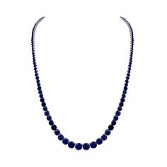 This riviera necklace is a true treasure, designed to be a showstopper. It is crafted in lustrous 14k white or yellow gold. The 0.50 center stone is the focal point of this necklace with graduating carat size Blue Sapphire on each side for a total of 8.00, 12.00 or 26.00 carat total weight Round Brilliant Cut natural blue sapphires. Each blue sapphire is meticulously selected to match in color, clarity, and set in a high polish 14k gold. It can be worn for weddings, galas, or special celebration Classic Blue Diamond Necklace With 17 Jewels, Formal Round Sapphire Necklaces, Elegant Gemstone Tennis Necklace, Elegant Round Gemstone Tennis Necklace, Formal White Gold Tennis Necklace With Gemstone, Luxury Sapphire Round Necklaces, Formal Sapphire Necklace With Brilliant Cut, Luxury Sapphire Round Necklace, Classic Round Sapphire Diamond Necklace