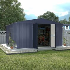 a small shed in the middle of a yard with a bicycle parked inside it,